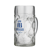 A clear glass beer stein with a faceted textured design and a central blue and white printed logo reading 'Bayeuthier Brauhaus' with a crown and monogram 'BB'.