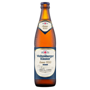 A single bottle of Weltenburger Kloster Anno 1050 beer on a plain white background. The amber glass bottle is covered in condensation droplets and features a cream and navy blue label with a red cross logo.