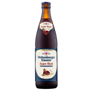A single bottle of Weltenburger Kloster Asam Bock strong dark beer, shown against a plain white background. The brown glass bottle is covered in condensation droplets, featuring a cream and navy blue label with a red cross logo.