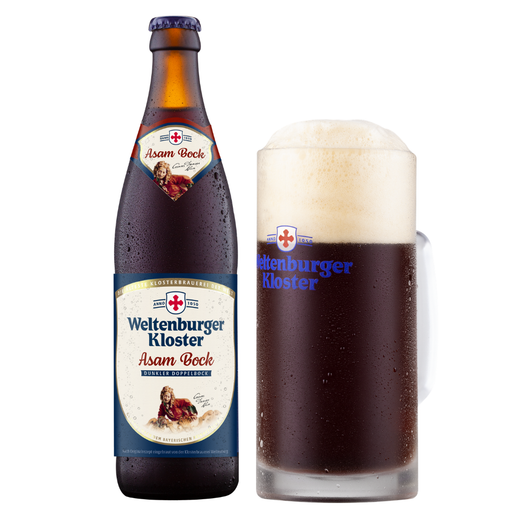 A bottle of Weltenburger Kloster Asam Bock beer next to a filled glass of the dark beer with a thick white foam head, on a white background.