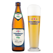 A bottle of Weltenburger Kloster Pils next to a tall glass of golden beer with white foam, on a plain white background.